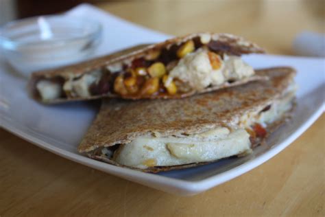 Baked chicken quesadillas made in the oven so you can make multiple quesadillas at the same time! The BEST Chicken Quesadilla Recipe Ever! - Paige Schmidt LLC
