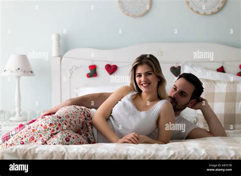 Young Attractive Couple Having Romantic Time In Bed Stock Photo Alamy