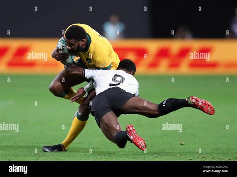 Australias Marika Koroibete Left And Fijis Frank Lomani Battle For The Ball During The 2019