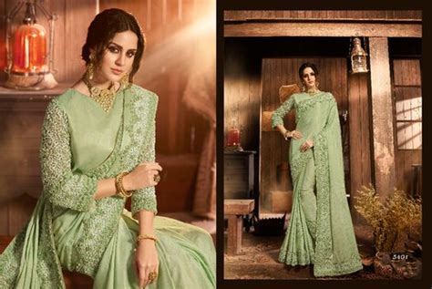 Zari Net Immaculate Silk Embroidered Party Wear Saree With Blouse