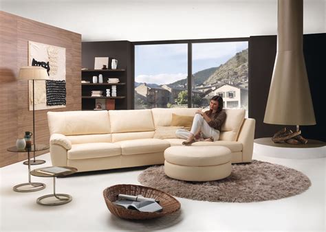 A sleek, armless sofa floats slightly away from the wall; 15 Ideas of Round Sofa Chair Living Room Furniture | Sofa Ideas