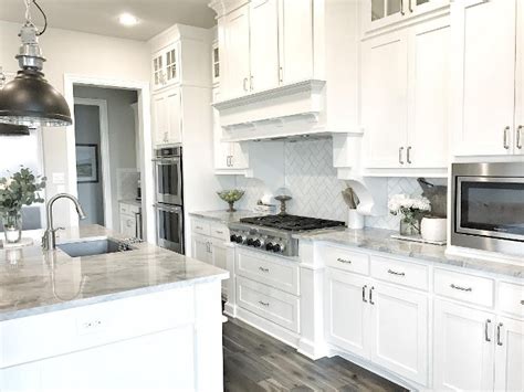 Pastel gray cabinets in kitchen with gold accents. Beautiful Homes of Instagram - Home Bunch Interior Design ...