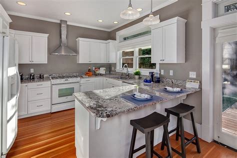 Image result for small kitchen with peninsula small kitchen decor kitchen design small kitchen layout. Contemporary Kitchen with U-shaped, Pendant light, Transom ...