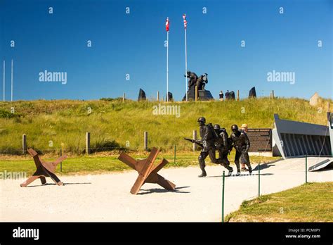 A Memerial And Sculptures Of Landing Crafts And Soldiers At The Utah Beach D Day Museum