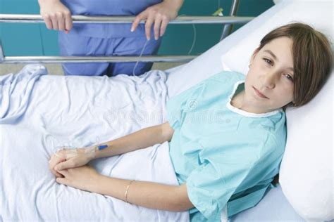 Little Girl In Hospital Bed With The Nurse Stock Photo Image Of