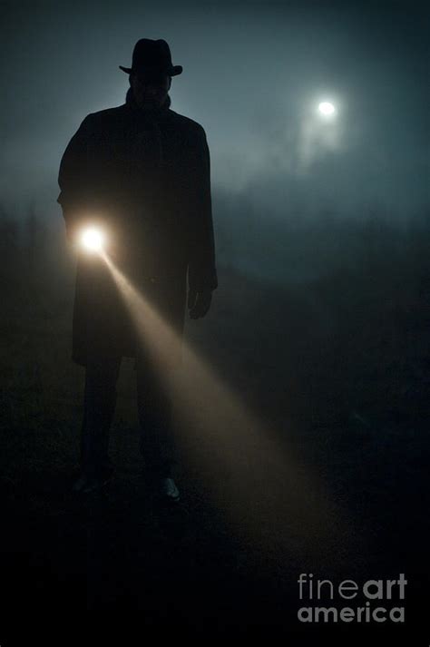 Man Searching At Night With A Torch Or Flashlight Photograph By Lee