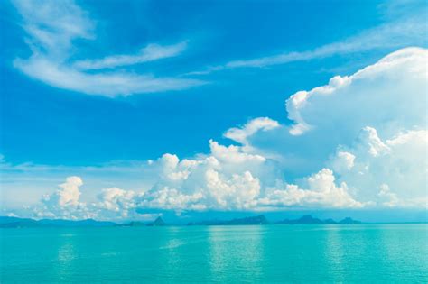 Beautiful White Cloud On Blue Sky And Sea Or Ocean Photo