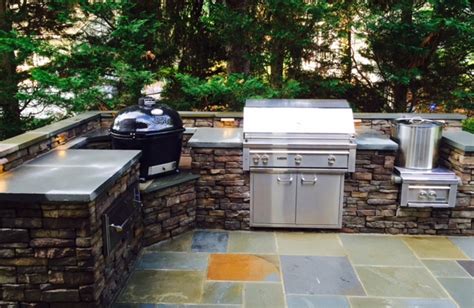 Use our system and save thousands now! Outdoor Kitchen with professional Lynx grills on a ...