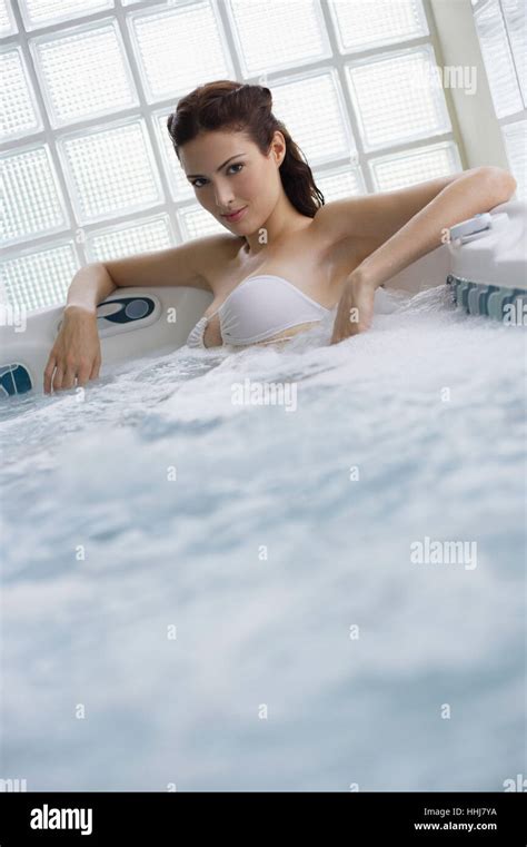 Woman Wearing All White In Jacuzzi Stock Photo Alamy