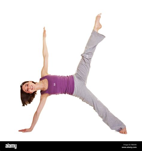 Young Smiling Flexible Woman Stretching Her Legs Stock Photo Alamy