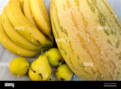 Fresh Healthy Fruits Melon Bananas Pears Yellow Fruit Background