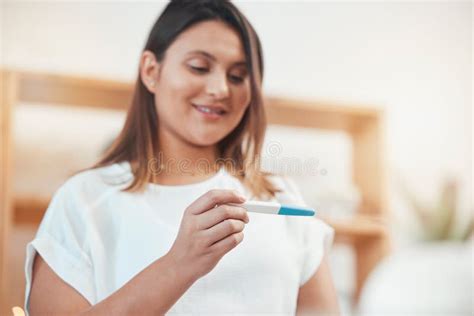 Happy Woman Pregnancy Test And Results In Home For Pregnant