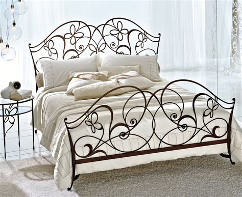 Pretty woman angry restrained handcuffs wrought iron bed frame. Ciacci Papillon Bed in Silver leaf uber cool designer silver bed amazing metal bed | Robinsons Beds