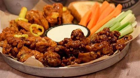 Asian bbq wings recipe made with ginger, garlic, soy sauce and honey. 5 best wings in the Triad