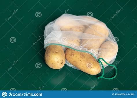 Potatoes In Ecological Packagingreusable Bags For Vegetables And