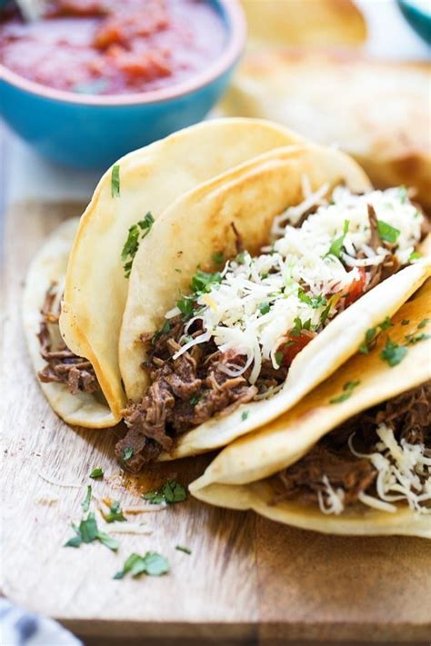 spicy shredded beef tacos cooking
