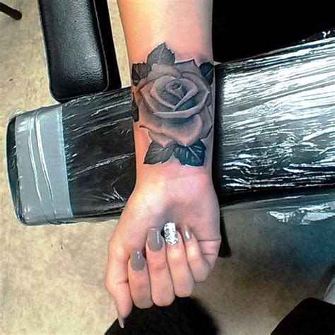 15 Awesome Black Rose Tattoos For Wrist Wrist Tattoo Designs