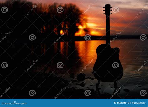 Guitar By The Lake At Sunset Time Stock Image Image Of Classic
