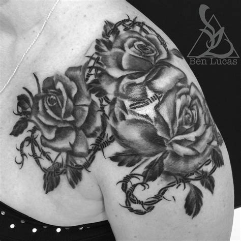 Skull tattoo with barbed wire roses. Rose tattoo. Black rose tattoo with barbed wire (With ...