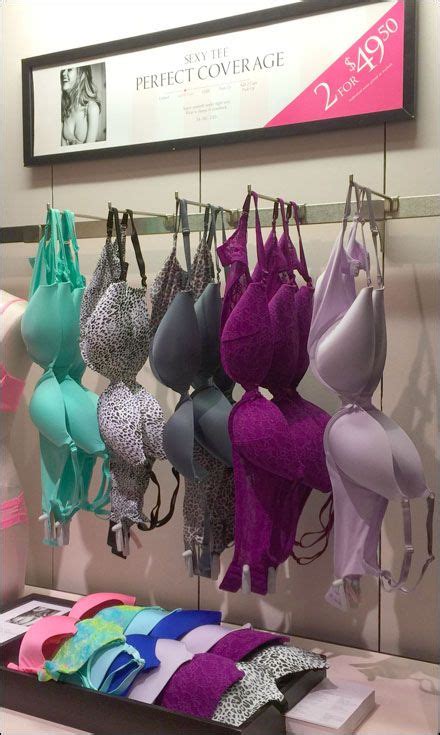 Several Bras Are Hanging Up On The Wall