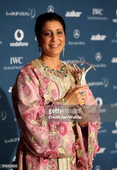 Nawal El Moutawakel With Her Lifetime Achievement Award Poses In The
