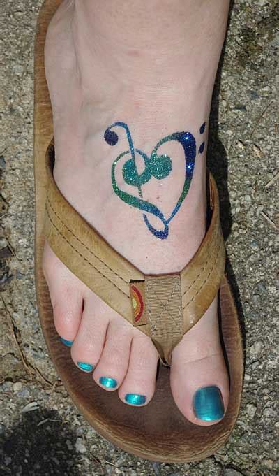 Blue Green Tattoo Ideas Of Music Tattoomagz › Tattoo Designs