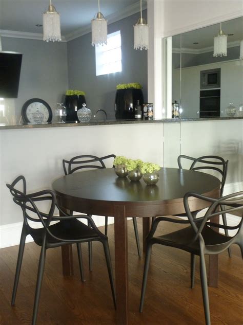 Sem pés nem cabeça dining chairs. Kitchen diner with black kartell Master chairs | Furniture ...