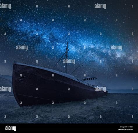 Shipwreck On The Shore And Milky Way In Iceland Stock Photo Alamy