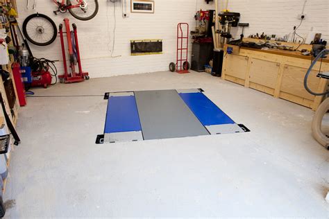 How To Install A Car Lift In Your Garage Carhampt