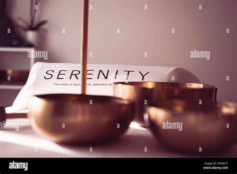 Word Serenity Printed On White Pillow With Sound Healing Therapy