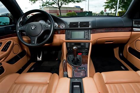 Black and tan door panels (combined tan inserts from a tan set with my original black ones), oem sand leather 18 way 2003 e39, manual, sport, debadged, full service history from new, staggered authentic 18 alpina softlines, m5 mirrors and trunk lip, =30% 3m tint. BMW M5: Beautifully Cleaned and Detailed E39 M5 Interior