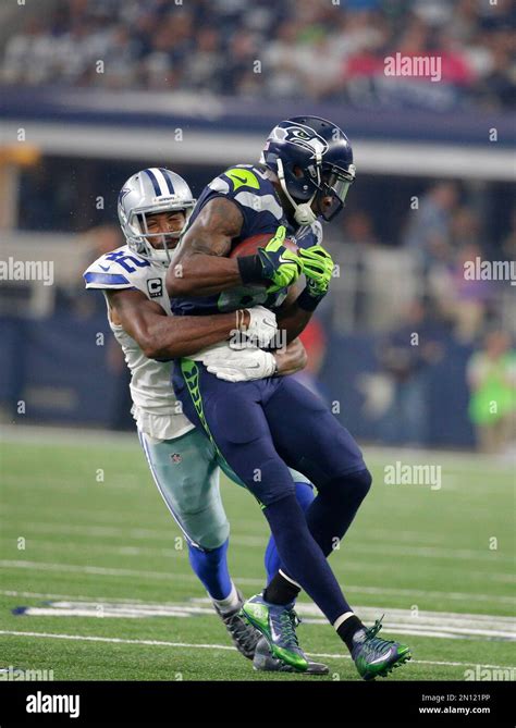 Seattle Seahawks Ricardo Lockette 83 Is Tackled By Dallas Cowboys