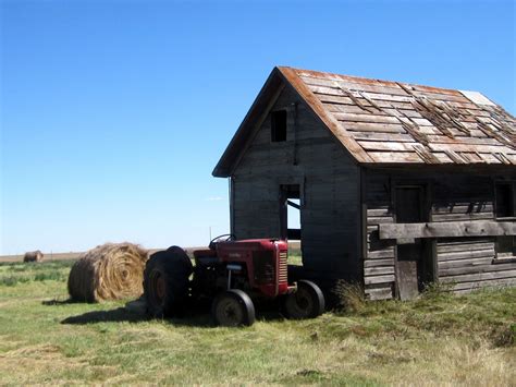 Massey Harris And Old Farm Buildings Near Avonlea Saskatchewan Old