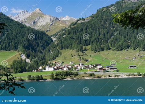 View Of An Idyllic And Picturesque Turquoise Mountain Lake Surrounded