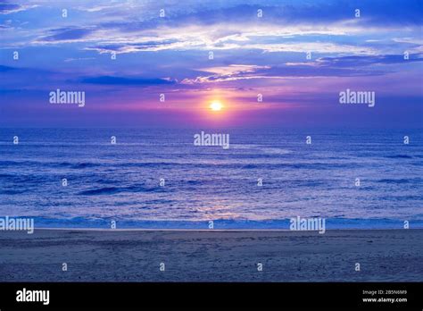 Early Morning Sunrise Over The Sea Stock Photo Alamy