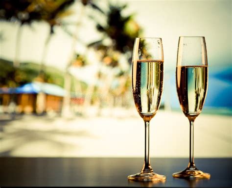 two champagne glasses on the beach exotic new year stock image image of romance beach