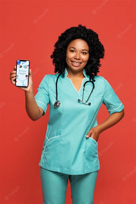 Premium Psd Black Nurse Holding Smartphone Mockup