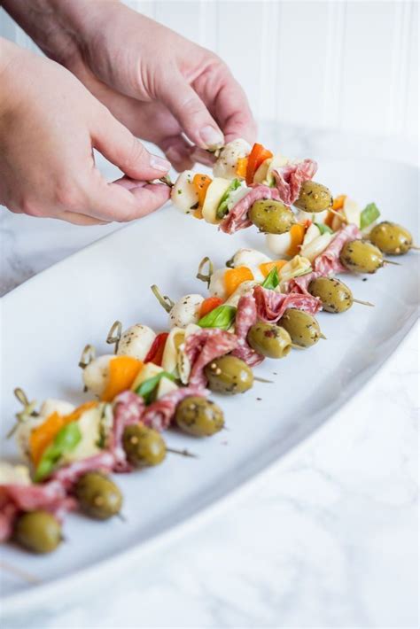 **finger sandwiches perfect for mad hatter party* checkerboard cheese sandwiches | myrecipes.com. Antipasto Skewers | Recipe in 2020 | Appetizer recipes, Easy appetizer recipes, Party food ...
