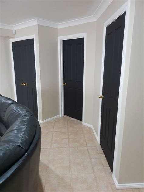 Matte Black Doors With Gloss White Trim And Warm Grey Walls Warm Grey