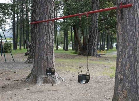 Rope swings are generally safe for kids who have developed some balance and upper body strength, but even then they pose some risk. Hanging A Porch Swing Between Two Trees | Swing set diy ...