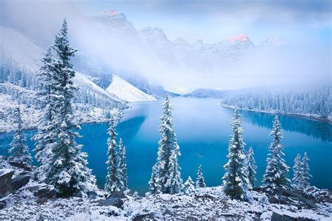 Mid Fall Snow Blankets Moraine Lake In The Canadian Rocky