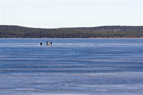 Fishermen On The Ice Fishing On The Frozen Lake Stock Image Image Of