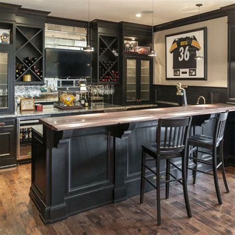 A wet bar is right there at the top of the wish list for a lot homeowners finishing the basement! 25 Cool And Masculine Basement Bar Ideas | HomeMydesign