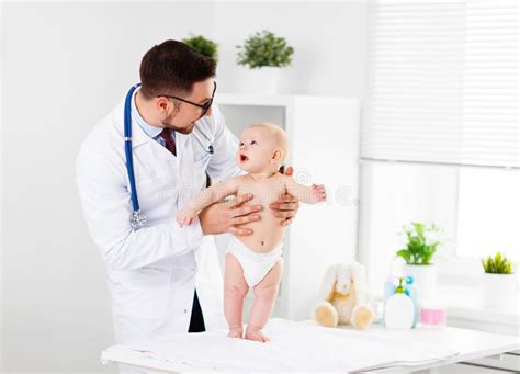 Doctor Pediatrician With Baby Child Stock Image Image Of Face Cute