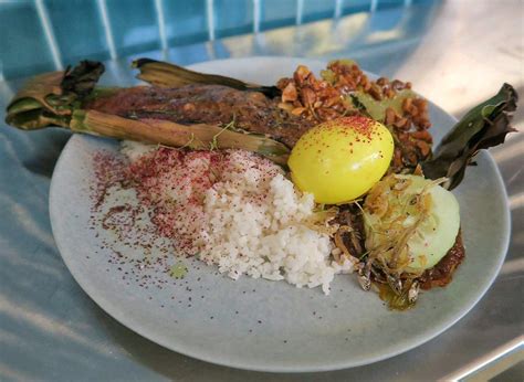 Nasi lemak is a dish originating in malay cuisine that consists of fragrant rice cooked in coconut milk and pandan leaf. Cheryl Tiu 張美鈴 | Personal Blog