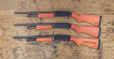 Remington 870 Tactical 12 Gauge Police Trade In Shotguns With Orange
