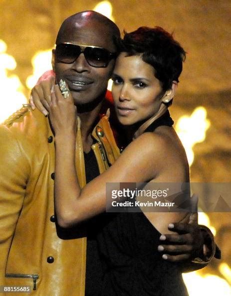 Actor Jamie Foxx And Actress Halle Berry Kiss Onstage At Spike Tvs