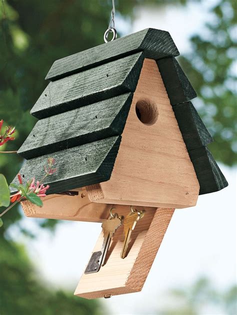 A Wooden Bird House Hanging From A Tree