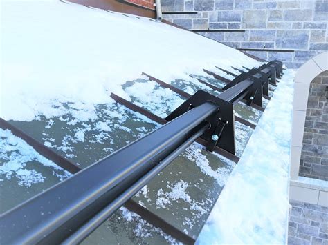 How To Stop Snow From Sliding Off Metal Roof Metal Roof Experts In