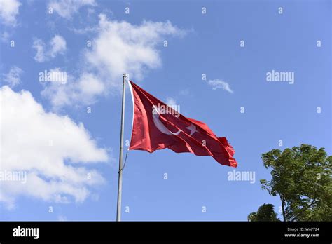 Turkish Flag Waving In Sky Stock Photo Alamy